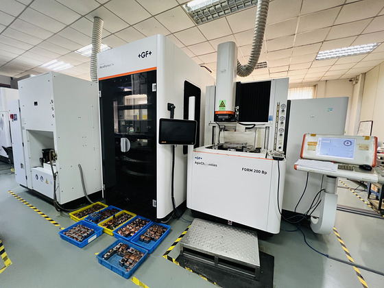 EDM machines with robot at the Fides Global Link tool shop